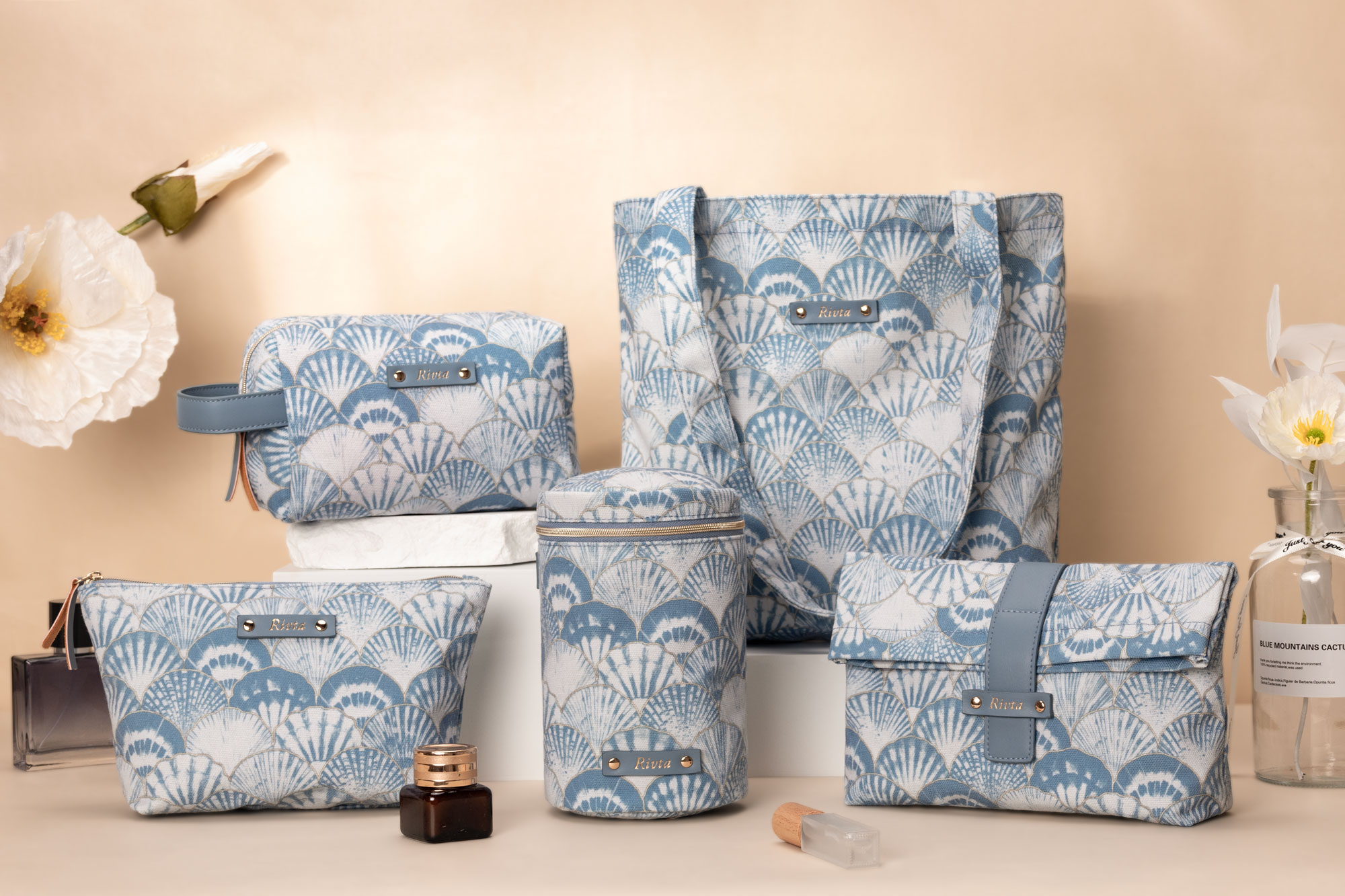 A collection of high-quality private label makeup bags showing different materials and styles