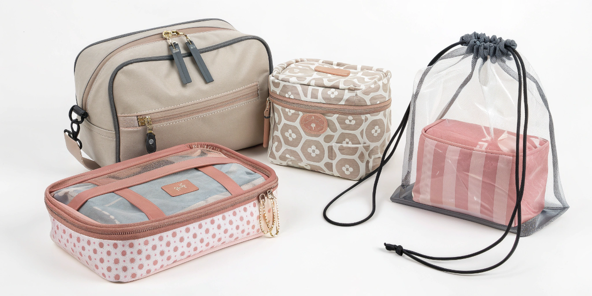 Types of Makeup Bags from Premium Manufacturers An assortment of different makeup bag styles: pouch, train case, drawstring, and clear PVC